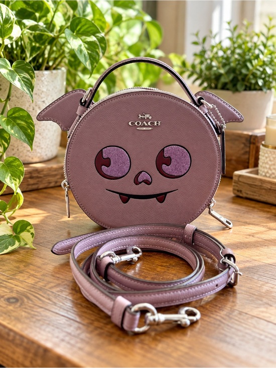 Coach Handbags - COACH Lavender Bat-Face Round Leather Crossbody Bag